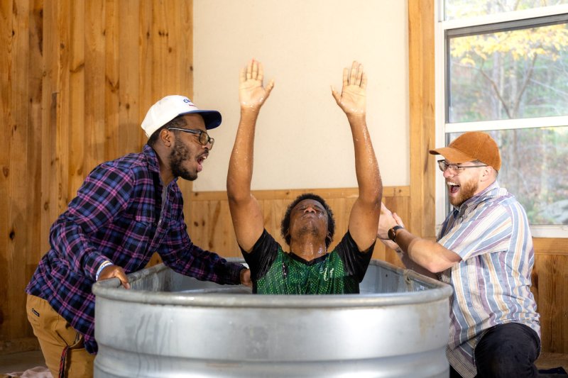 A water baptism at the retreat. Photo by Sydney Moore